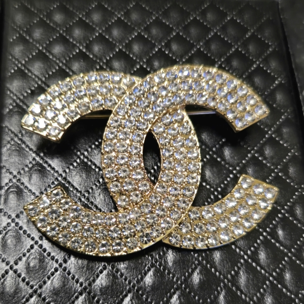 sparkly gold brooch, new